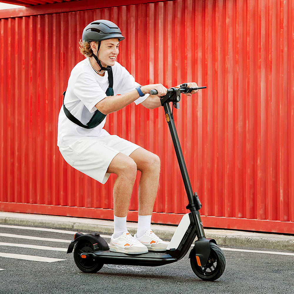 NIU KQI1 Pro Electric Scooter Lifestyle Riding Guy