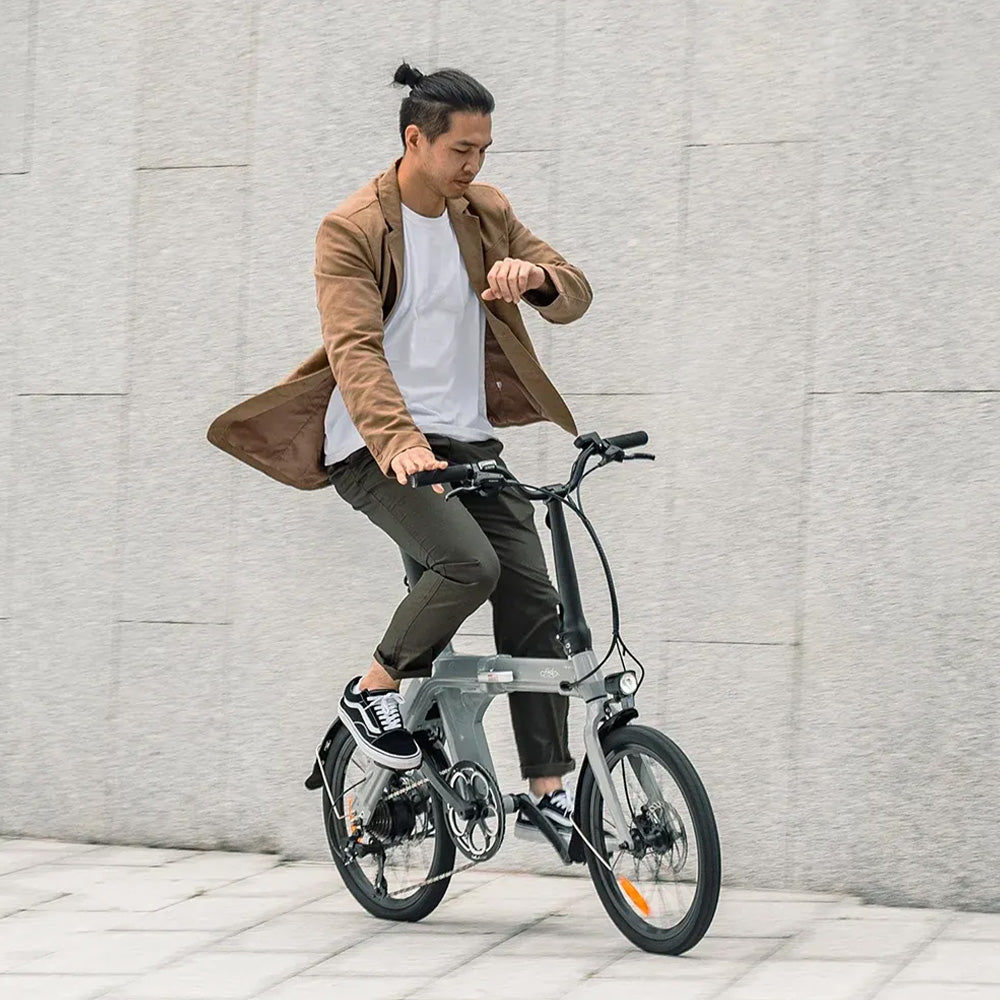 fiido d11 2025 folding electric bike lifestyle riding concrete wall
