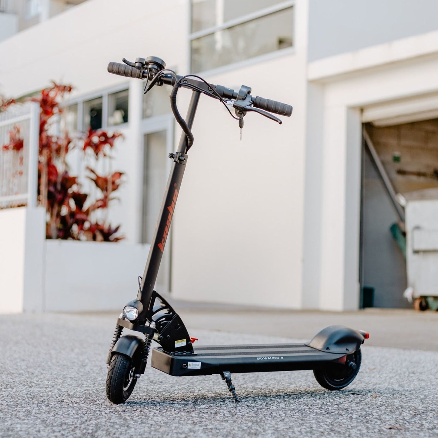 kaabo skywalker 8 electric scooter black lifestyle static garage door