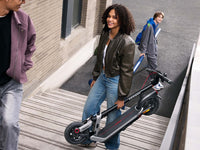 segway ninebot e3 pro electric scooter lifestyle folded steps