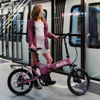 MATE Icon Folding Electric Bike Lifestyle Bloom