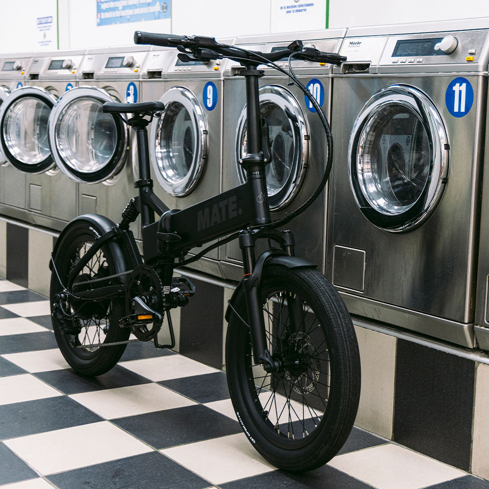 MATE X Evo Folding Electric Bike Lifestyle Laundry