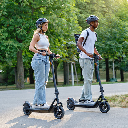 niu kqi100 pro electric scooter lifestyle pair riding