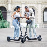 niu kqi100 pro electric scooter lifestyle pair static