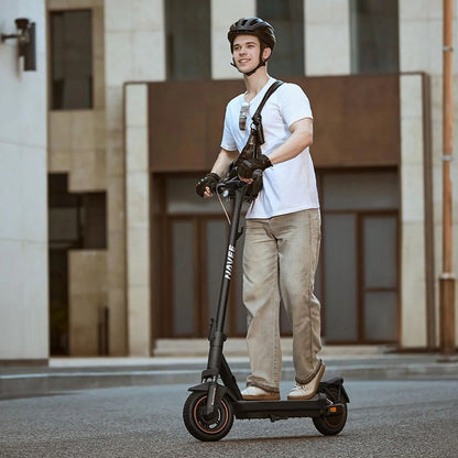 Navee GT3 Max Electric Scooter Lifestyle Riding Building