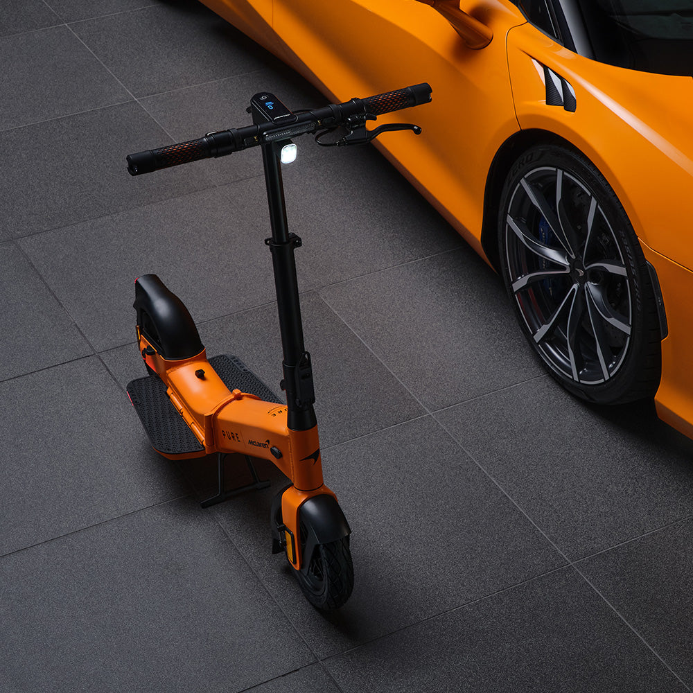pure x mclaren flex papaya with car